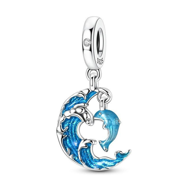Luna olas y delfín