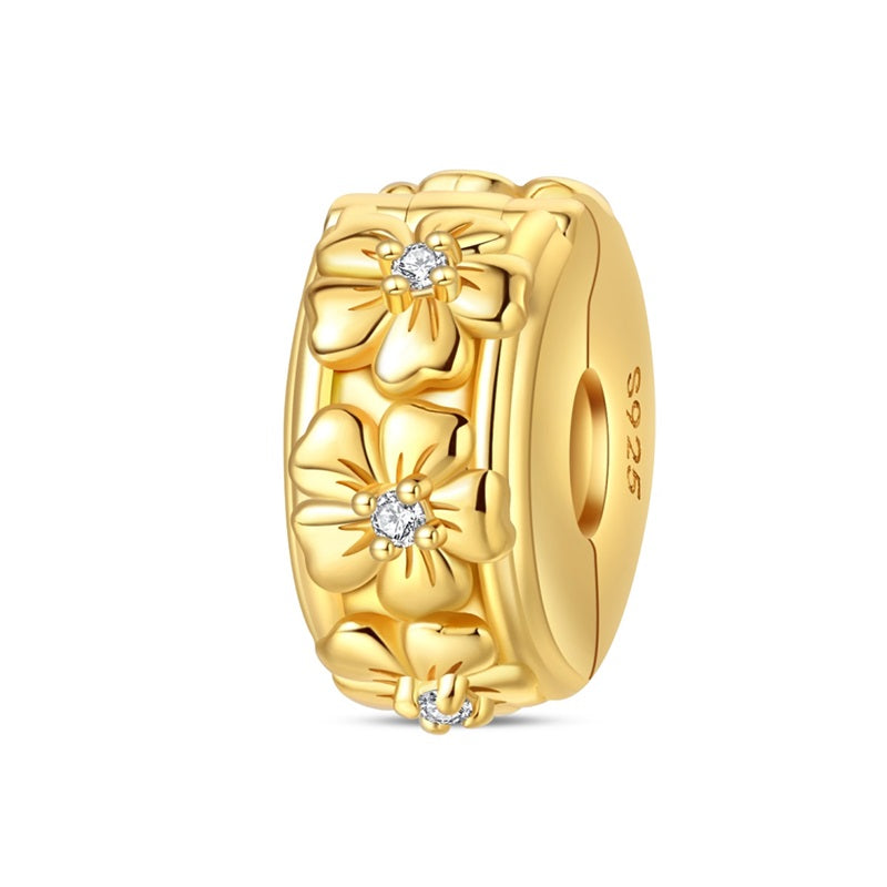 Clip flor oro